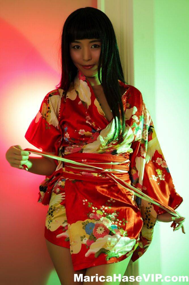 Japanese beauty Marica Hase works free of an Oriental robe for hot nude poses - #12