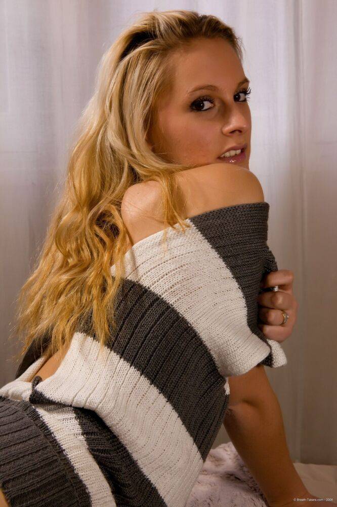 Blonde chick Joe shows her bald pussy in a sweater and black boots - #12