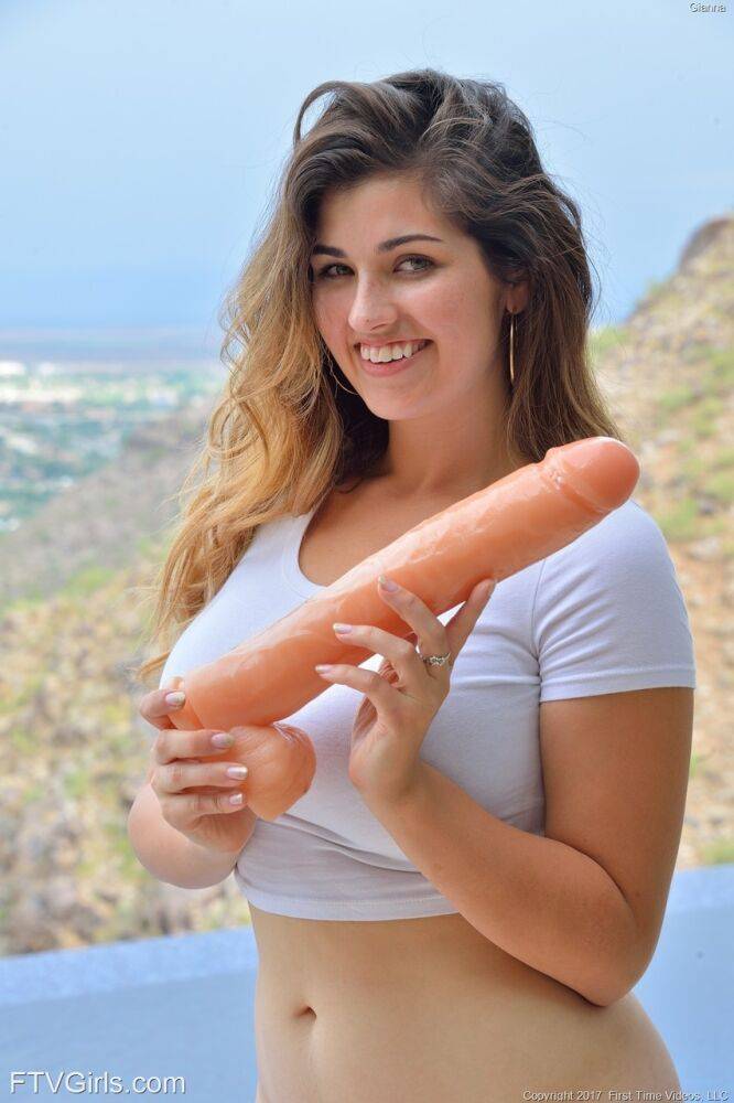 Cute teen girl inserts a huge dildo into her pussy before self fisting - #3