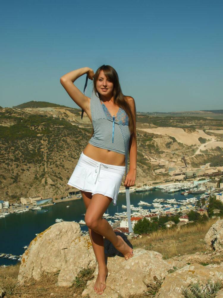 Barely legal girl Macaria Y gets totally naked on a hill overlooking a marina - #3