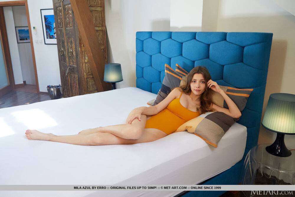 Sweet teen Mila Azul removes a bodysuit to model totally naked on her bed - #5