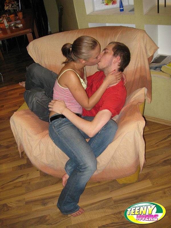 Horny teens make out while getting naked for a fuck on a comfy chair - #12