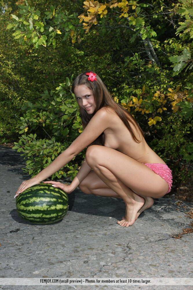 Adorable teen Lena strikes tempting nude poses while eating a watermelon - #13