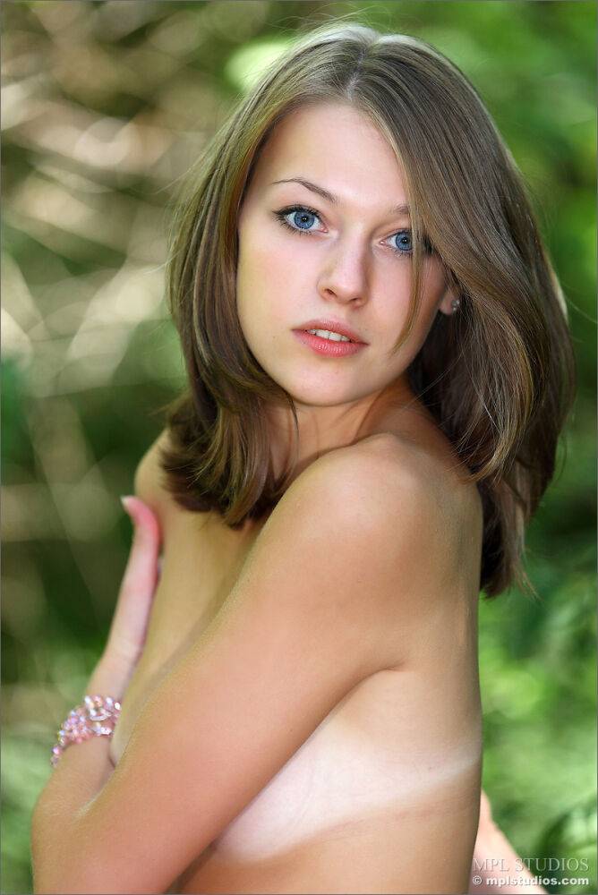 Innocent looking teen shows her tan lined body wearing a tutu in the forest - #2