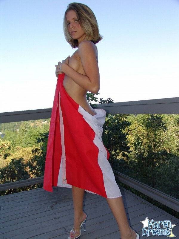 Canadian teen Karen wraps her naked body in a flag on her back deck - #4