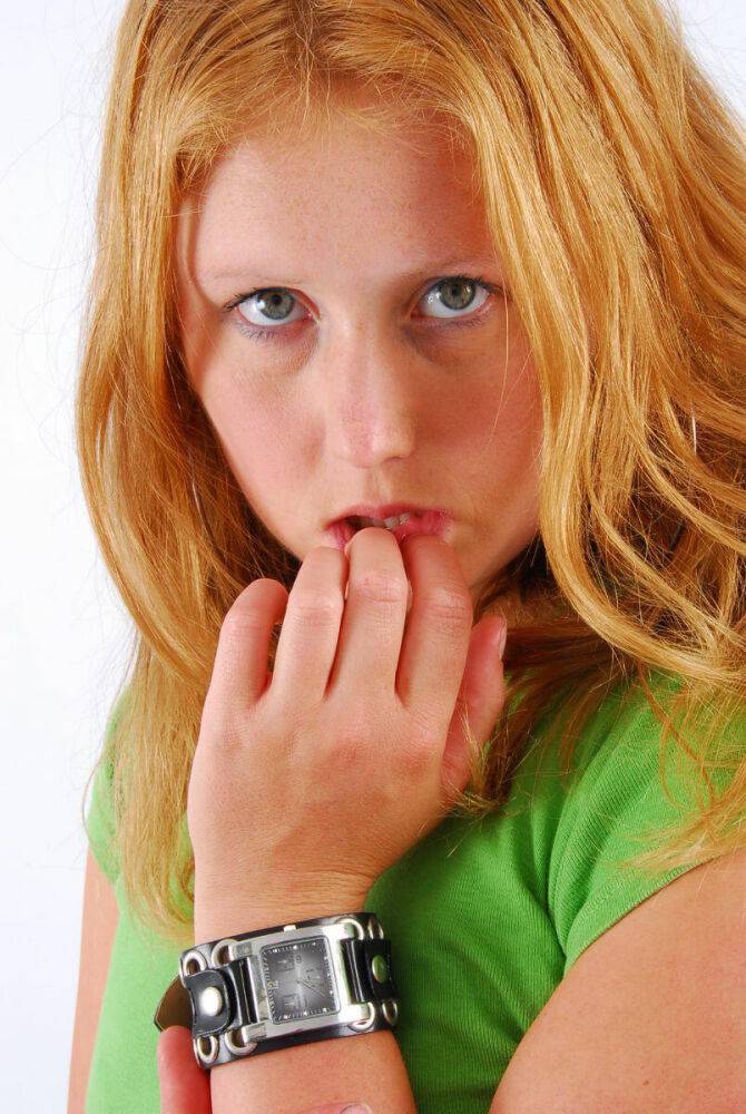 Natural redhead Judy models a double buckle cuff watch during SFW action - #13