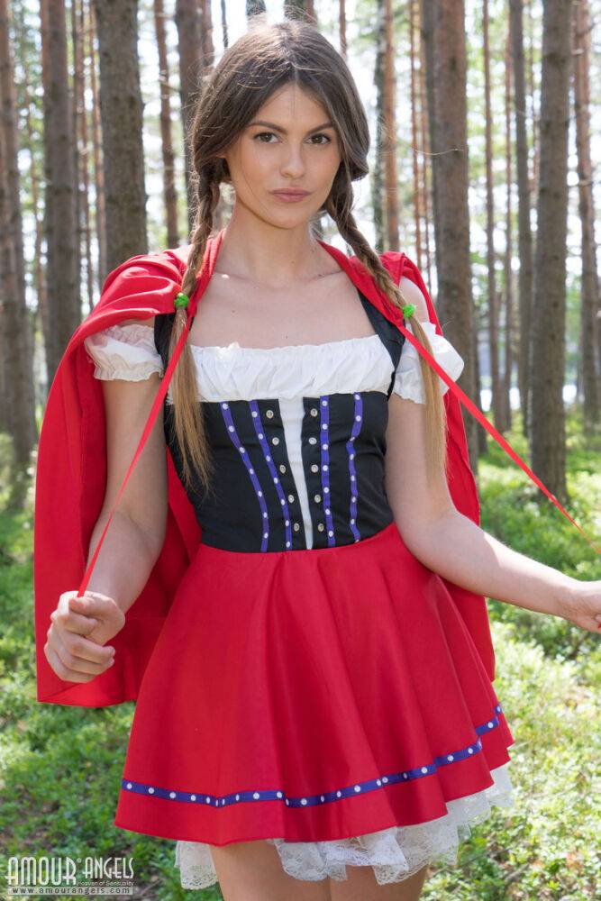 Teen amateur removes a Little Red Riding Hood outfit to get naked in the woods - #13