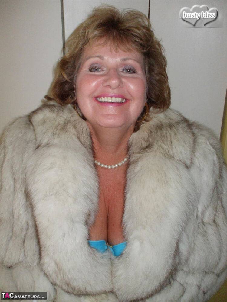 Chubby mature woman Busty Bliss releases her tan lined tits from a fur coat - #3