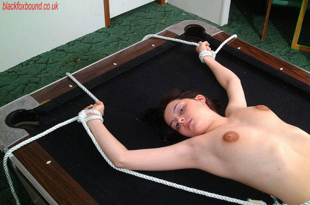 Totally naked white girl is tied to a chair and then to a pool table - #16