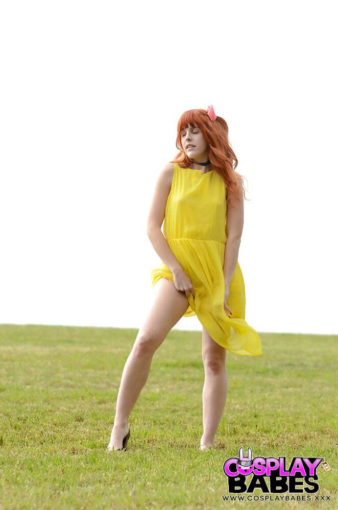 Amarna Miller poses in a beautiful yellow dress while outside - #12