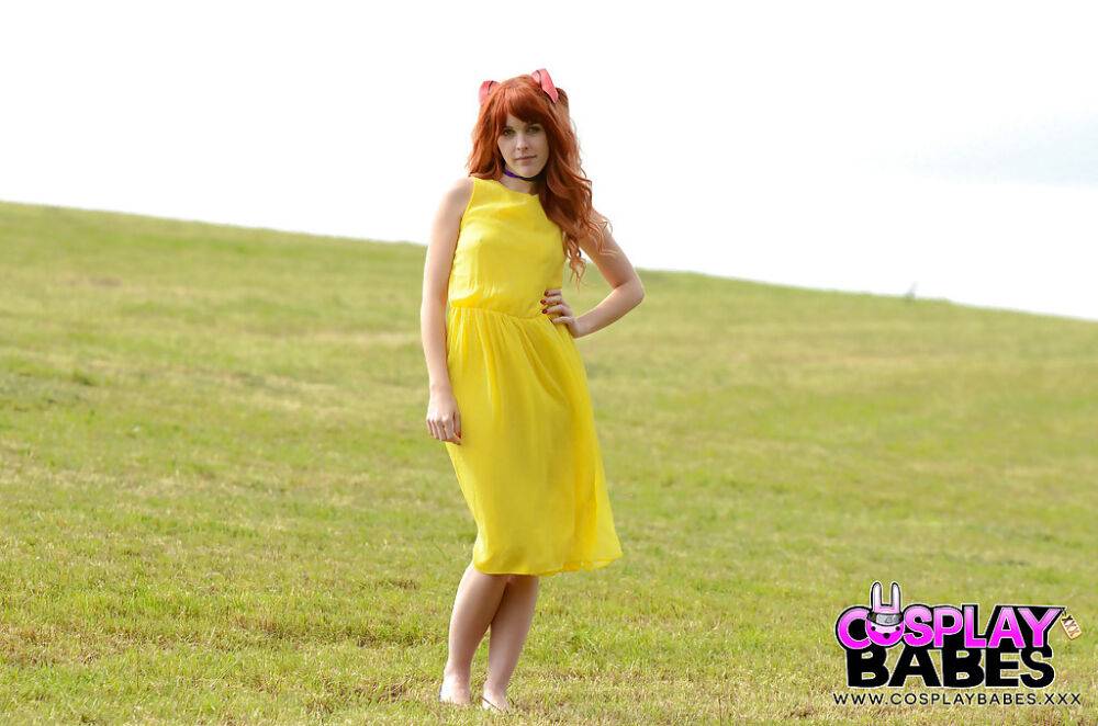 Amarna Miller poses in a beautiful yellow dress while outside - #13