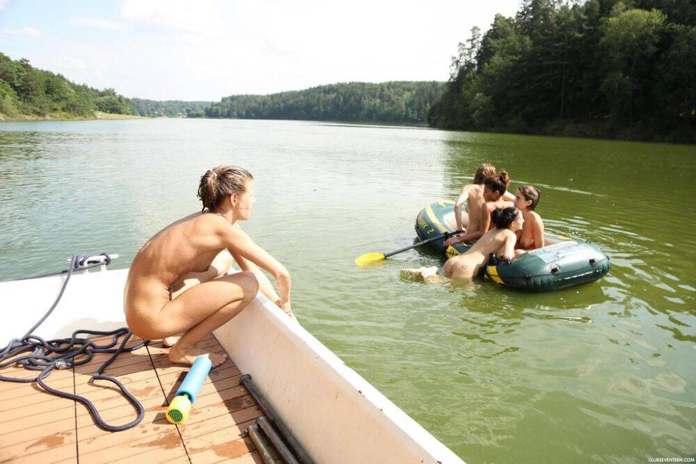 A group of teenage girls go rafting on a river in the nude - #10