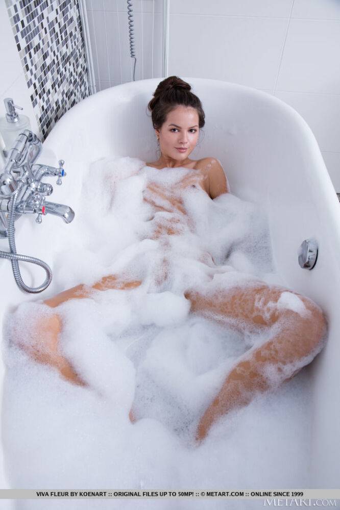 Beautiful teen Viva Fleur lets her hair down while taking a bubble bath - #1