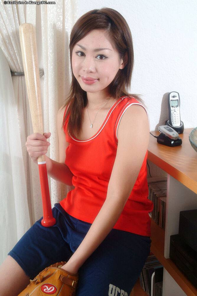 Brunette Asian teen Yumi teases her amateur pussy with a bat - #15