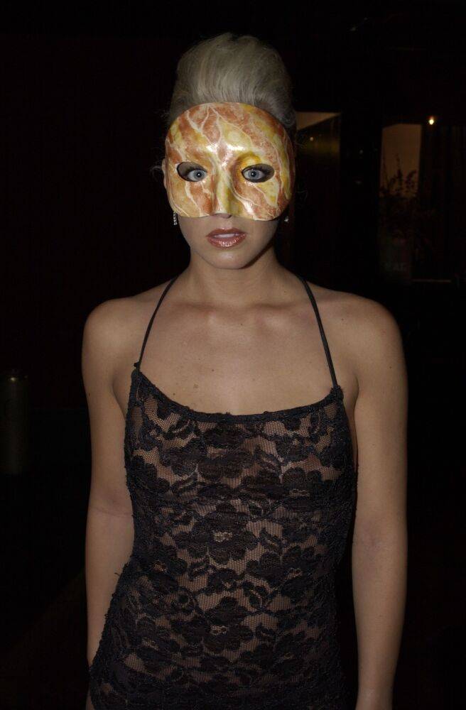 Blonde chick models in the nude in building lobby wearing a mask - #5