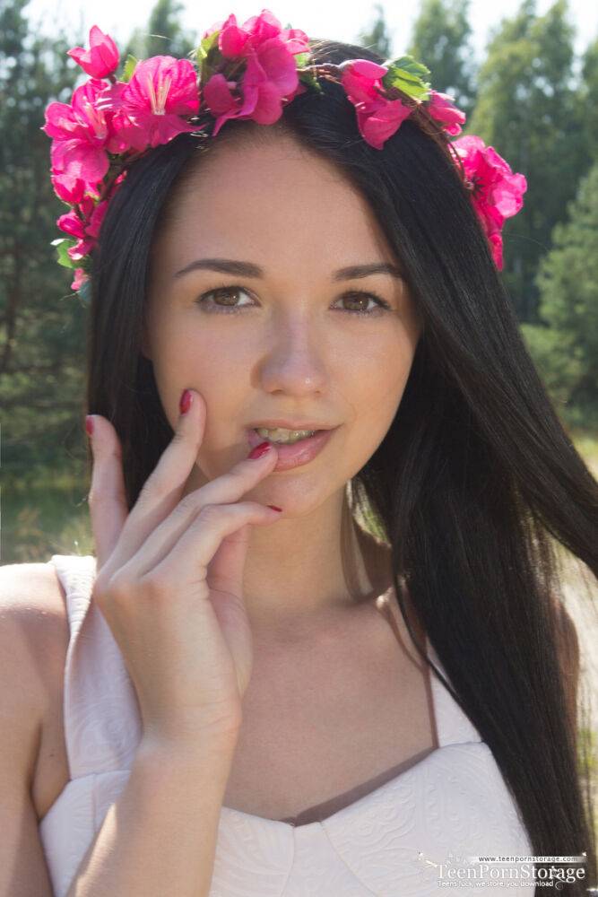 Young brunette Olivia wears a crown of flowers while exposing her clit - #8