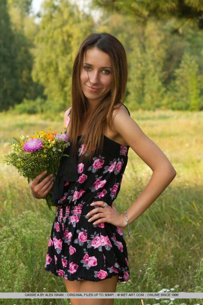 Slim solo girl Cassie A showing off tight teen body in a grassy meadow - #10