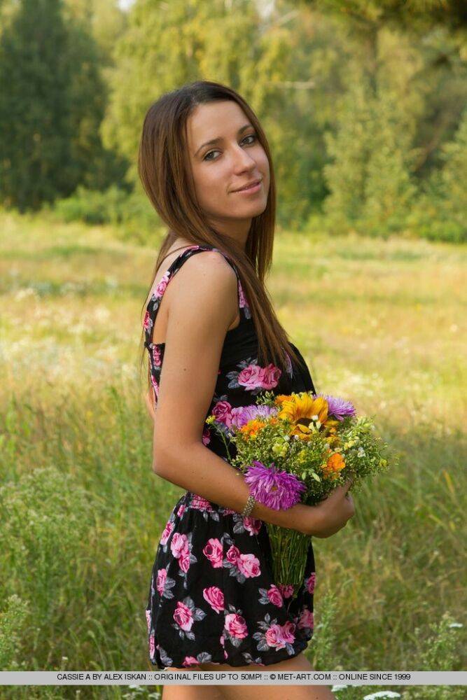 Slim solo girl Cassie A showing off tight teen body in a grassy meadow - #6