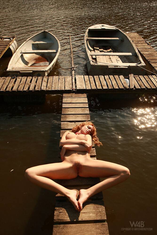 Sexy girl Carmen Kees models totally naked on a dock during solo action - #13