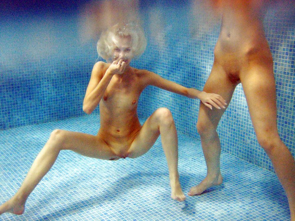 Petite teenage chicks have some lesbian fun using their toys in the pool - #11