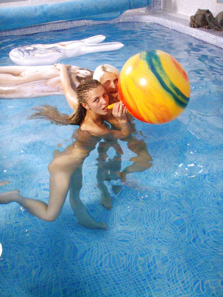 Petite teenage chicks have some lesbian fun using their toys in the pool - #5