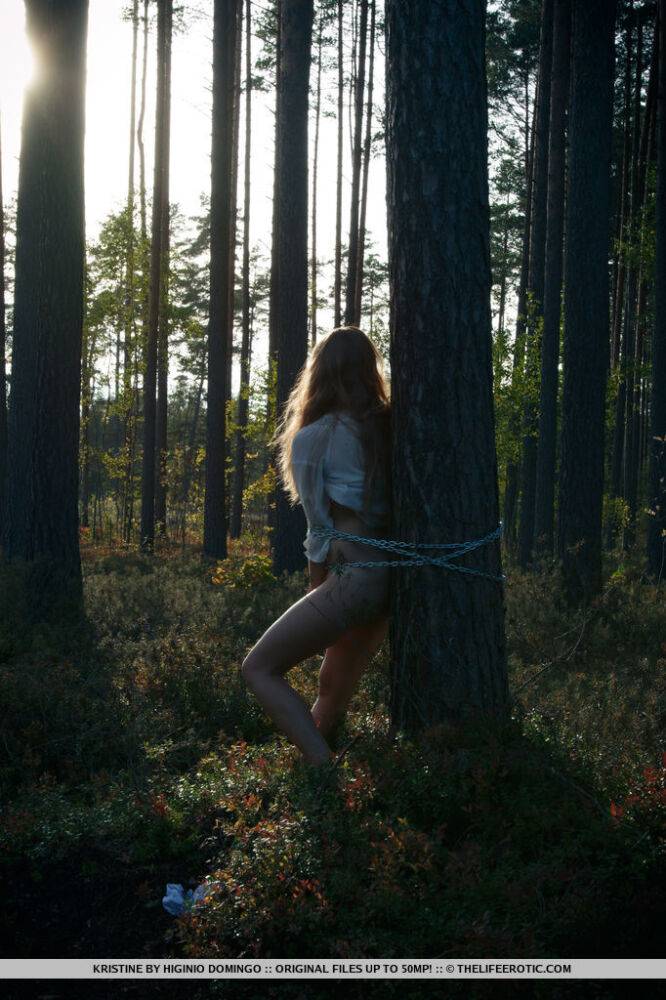 Handcuffed teen Kristine masturbates while being chained to a tree in woods - #14