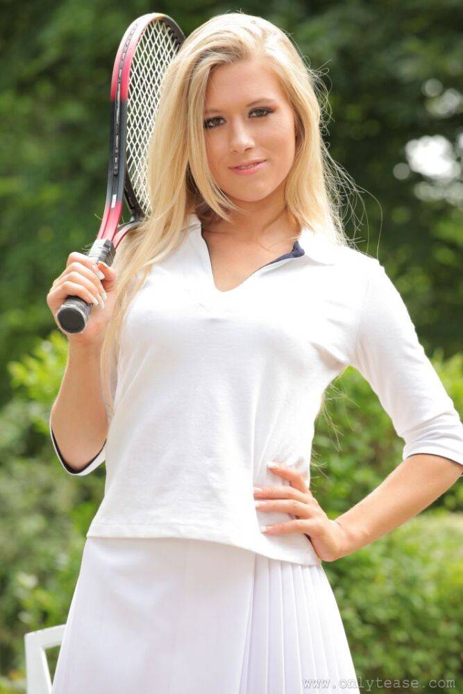 Natural blonde Michelle Moist doffs tennis attire to pose nude on a patio - #16