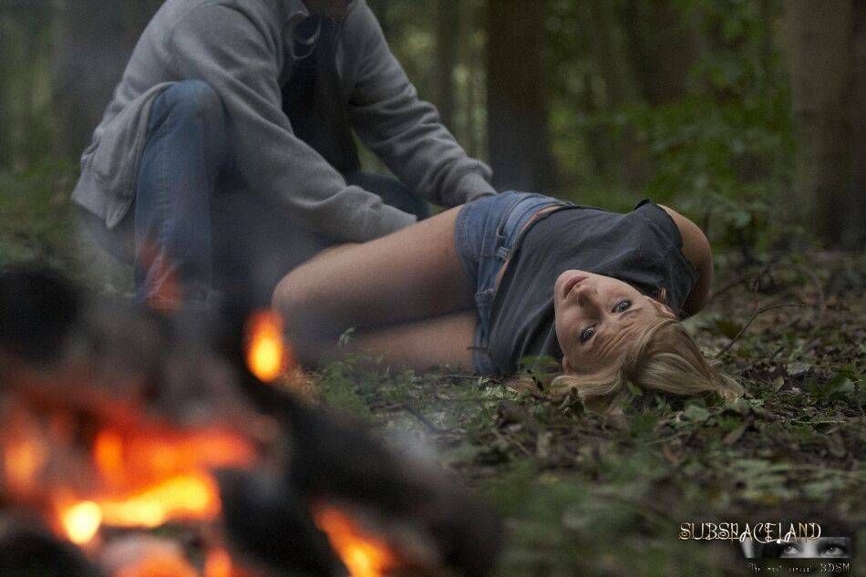 Busty hot blonde Caroline tied to a tree in the woods for naked ass whipping - #7