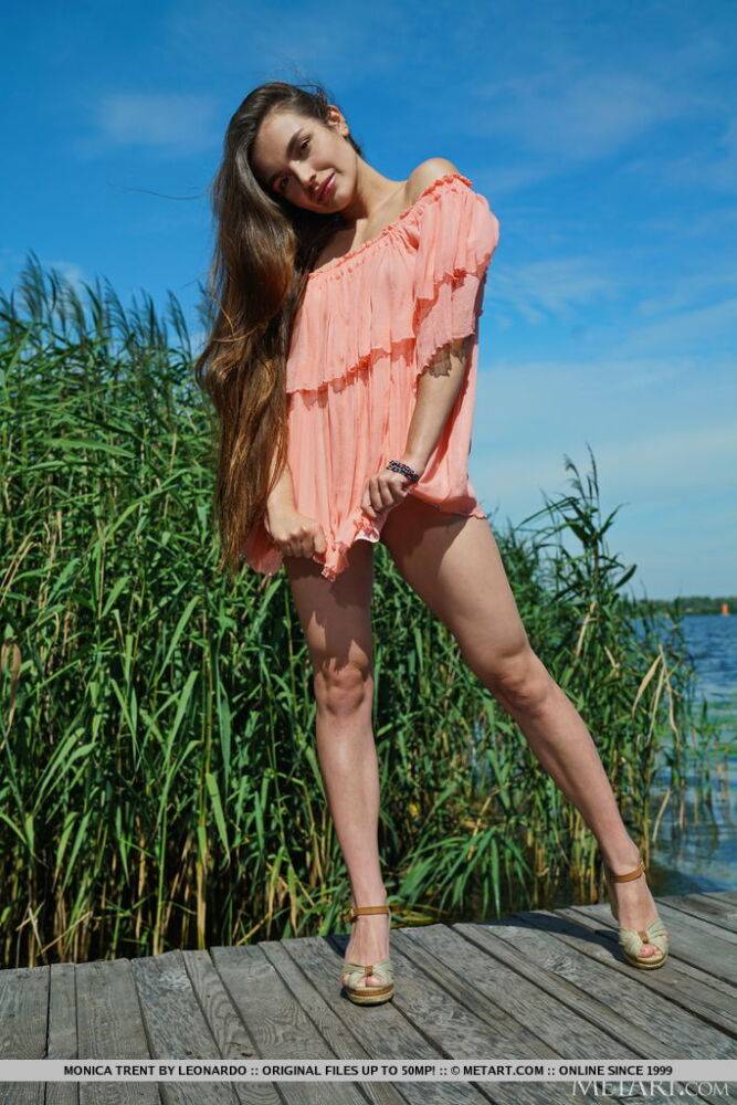 Long haired teen Monica Trent strikes great nude poses on a dock - #4