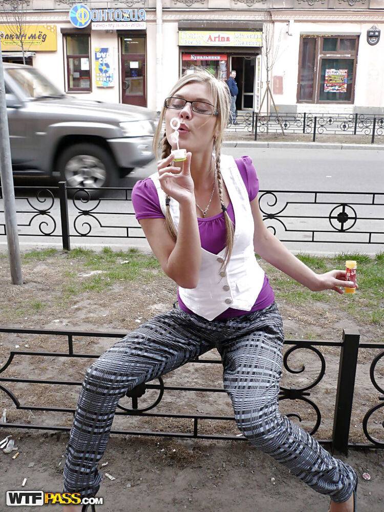 Frisky blonde amateur in glasses showcasing her goods in a public place - #11