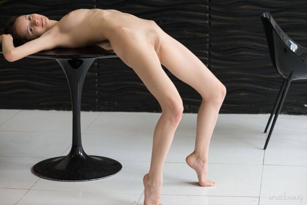 Slim teen Eiby Shine gets naked before doing the backwards crab over a table - #8