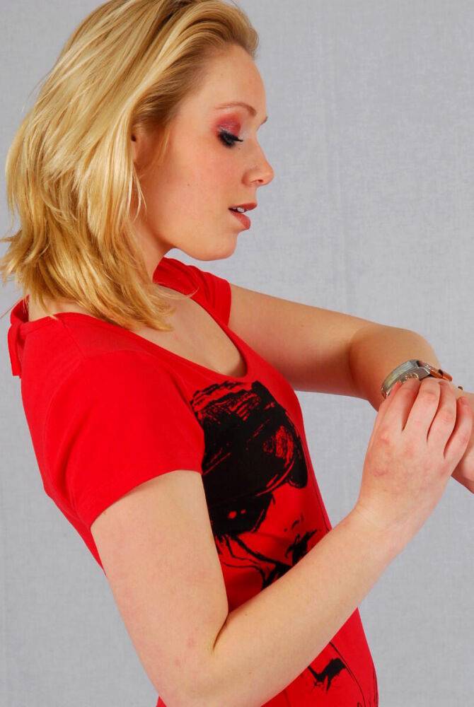 Strawberry blonde Sanne shows off a big Geneva watch during a non-nude scene - #13