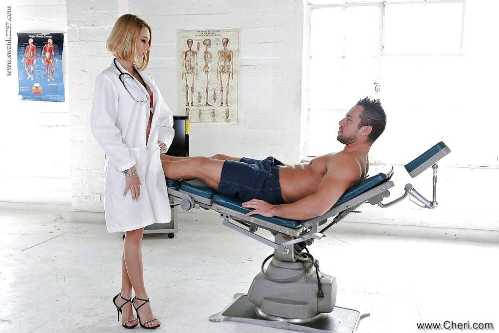 Blonde nurse Erica Foutos giving a muscular patient a blowjob - #14