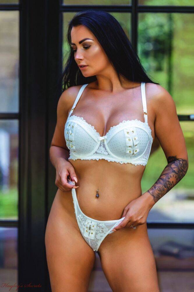 Inked UK model Kelli Smith bares her great body in heels outside a patio door - #11