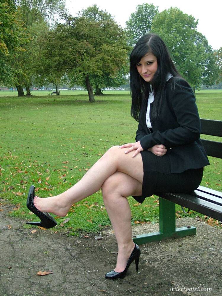 Fully clothed model Nicola takes a walk on park pathway in her new black pumps - #14