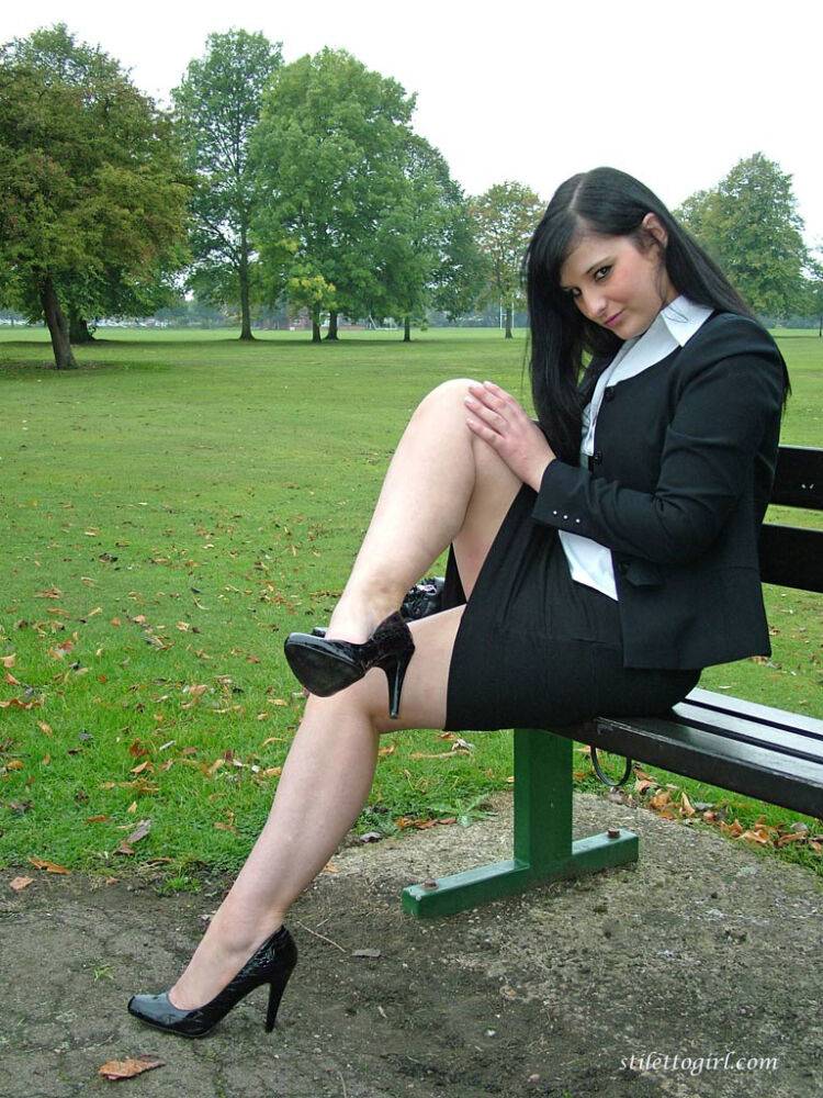 Fully clothed model Nicola takes a walk on park pathway in her new black pumps - #16