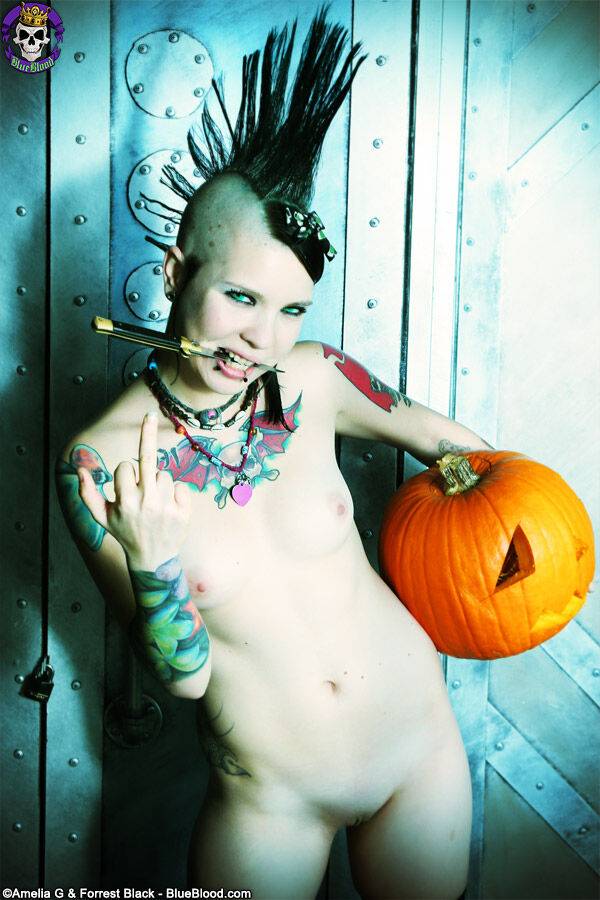 Alternative girl Tara Toxic carves a pumpkin in thigh highs and boots - #10