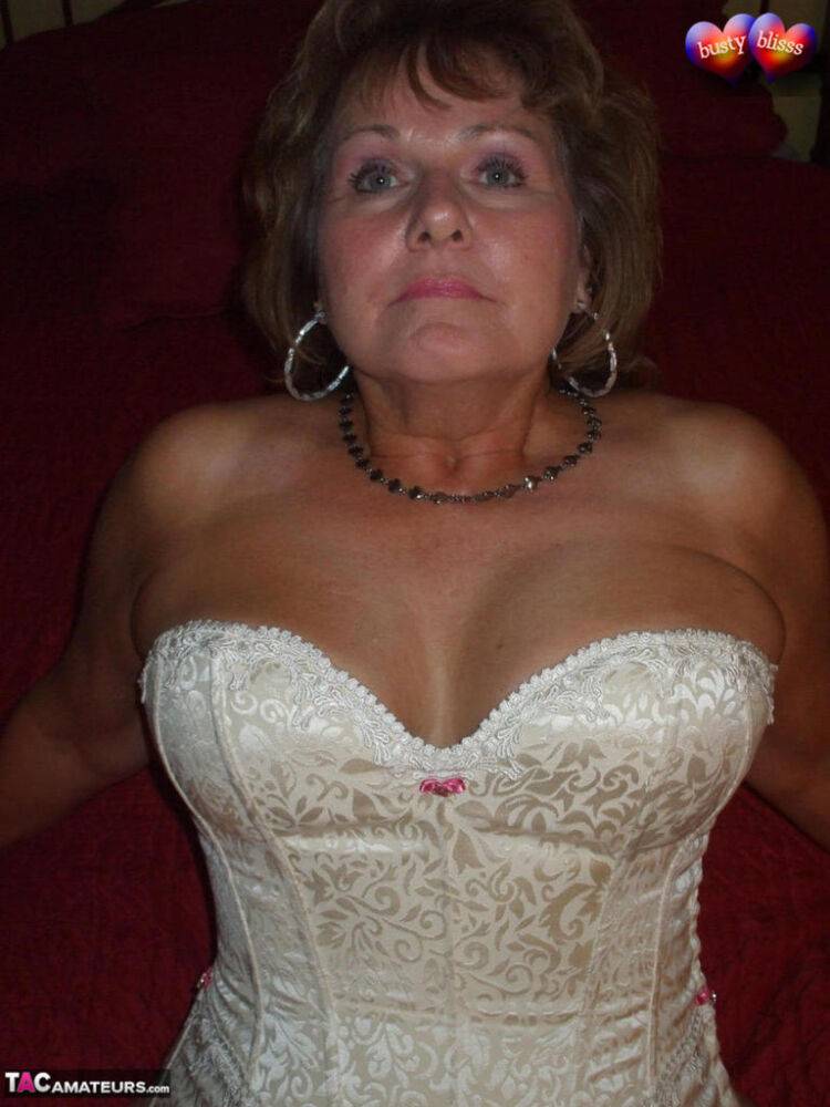 Mature woman models non nude in a corset and nylons with garters - #15