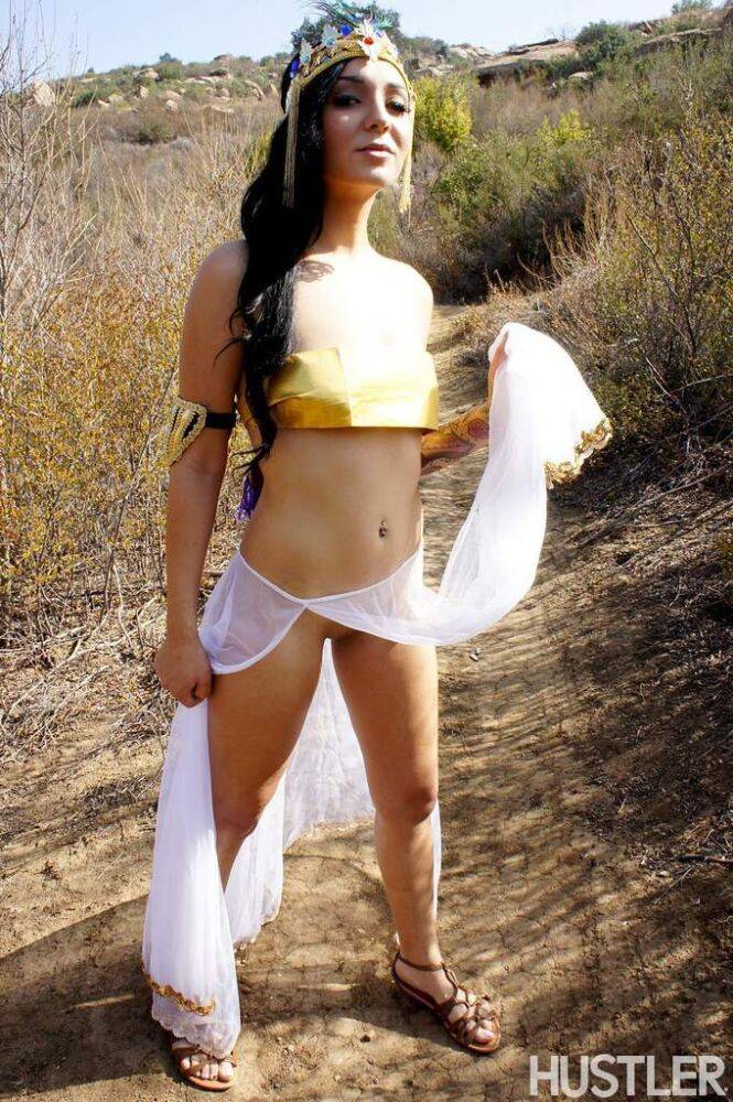 Brunette chick Aimee Black slips off exotic attire on a dirt path in the hills - #15