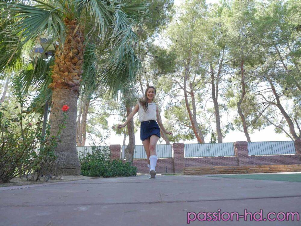 Teen girl Lilly Ford heads outdoors in a short skirt for a flashing session - #16
