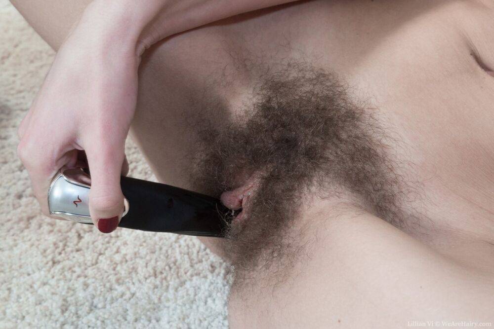 Amateur housewife relaxes at day's end by stuffing her hairy pussy with a dido - #4