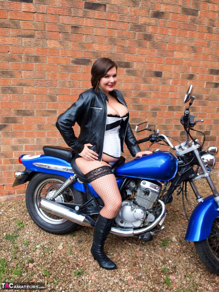 Chubby amateur Roxy unleashes her great tits on top of a motorcycle - #4