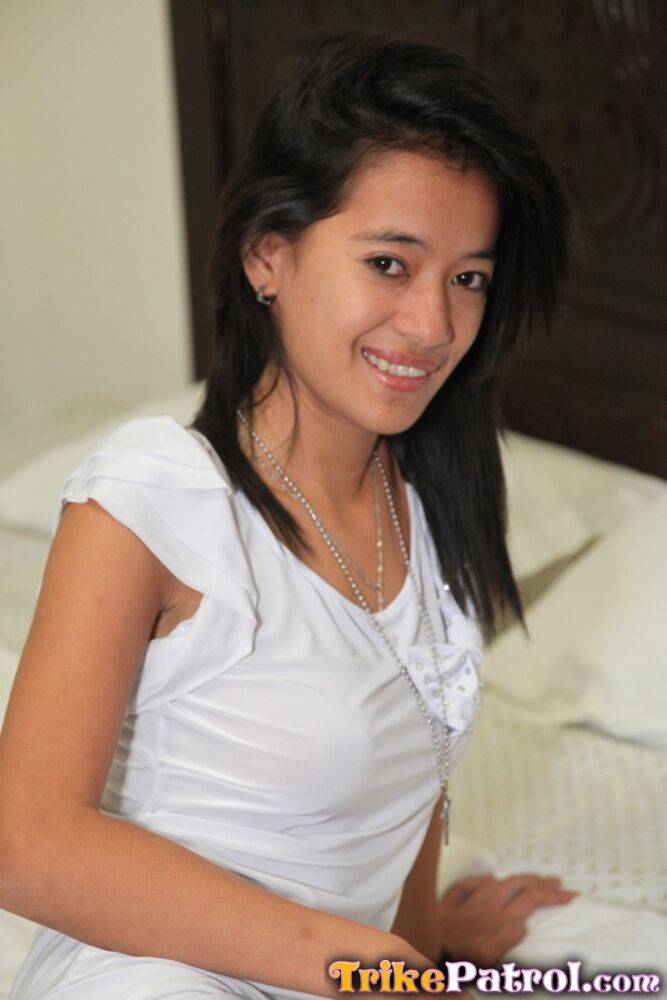 Filipina girl wears a nice smile while making her nude posing debut on a bed - #15