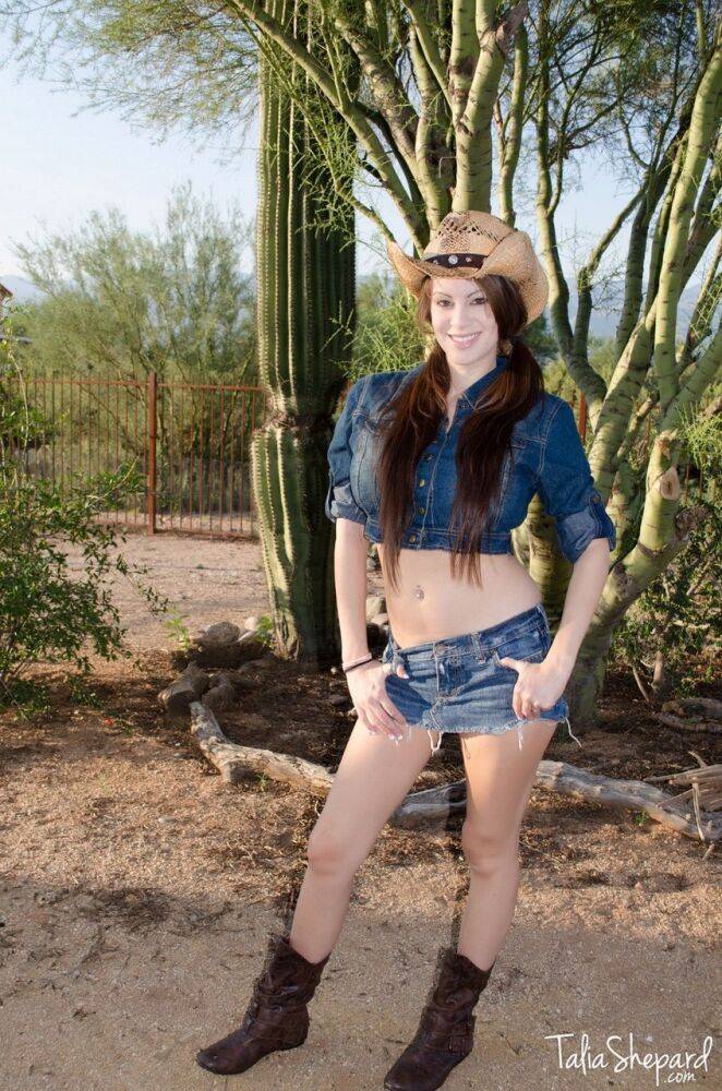 Solo model Talia Shepard exposes her fake tits wearing a straw hat at a farm - #5