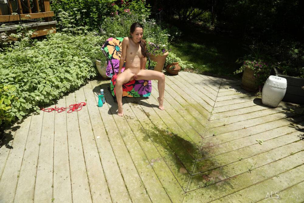 Thin teen girl Freya Von Doom takes a piss on the patio after fisting her twat - #4