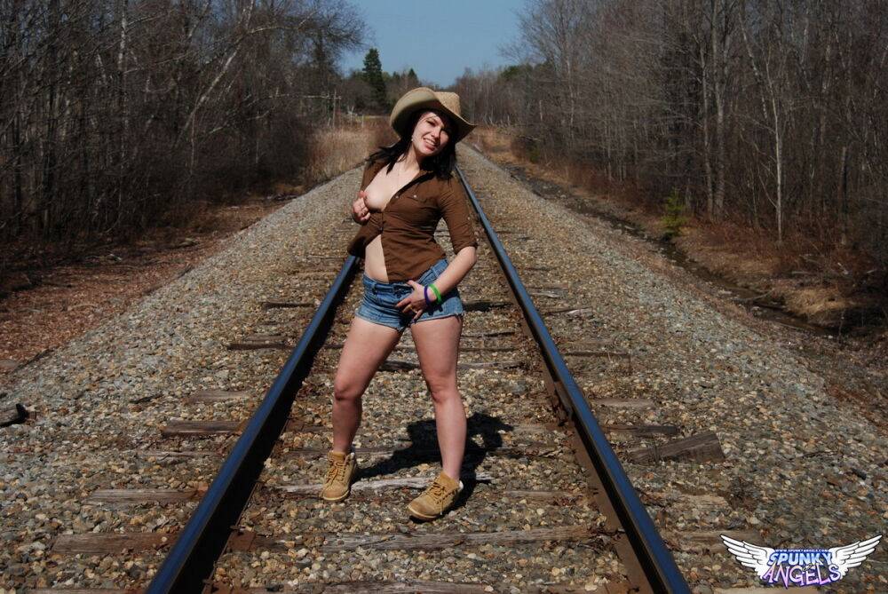 Young amateur Emily Love exposes herself on railway tracks in a hat and boots - #4