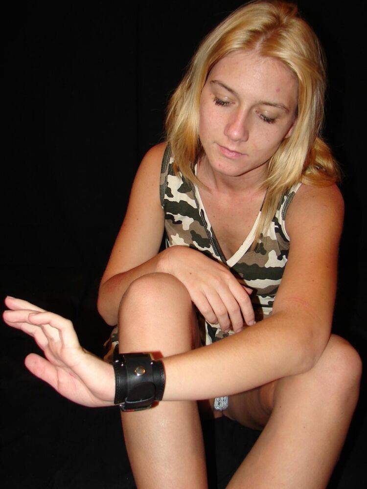 Blonde amateur Gina admires her Axcent watch during a non-nude gig - #4