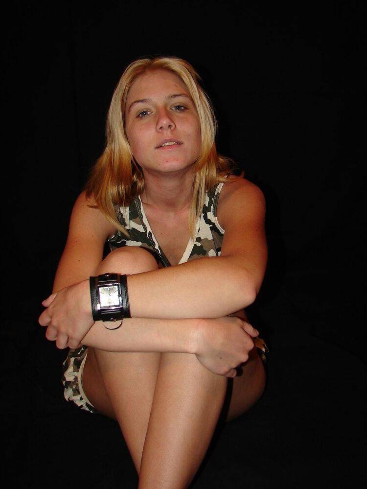 Blonde amateur Gina admires her Axcent watch during a non-nude gig - #9