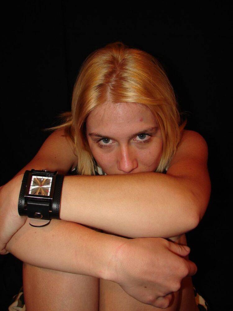 Blonde amateur Gina admires her Axcent watch during a non-nude gig - #12