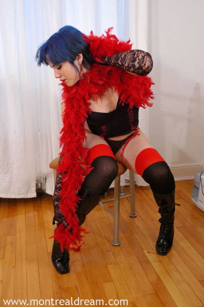 Amateur chick displays her small tits while draped in a feather boa - #9